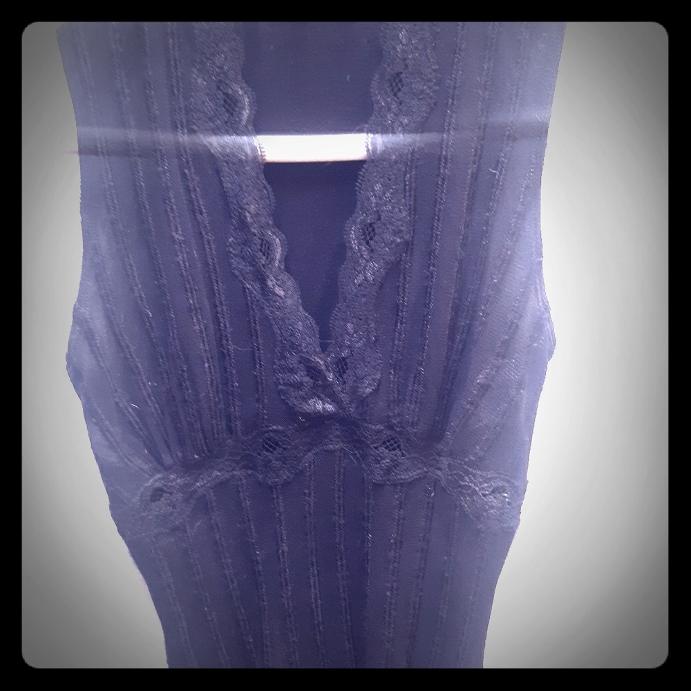 Lace, form fitting BeBe top